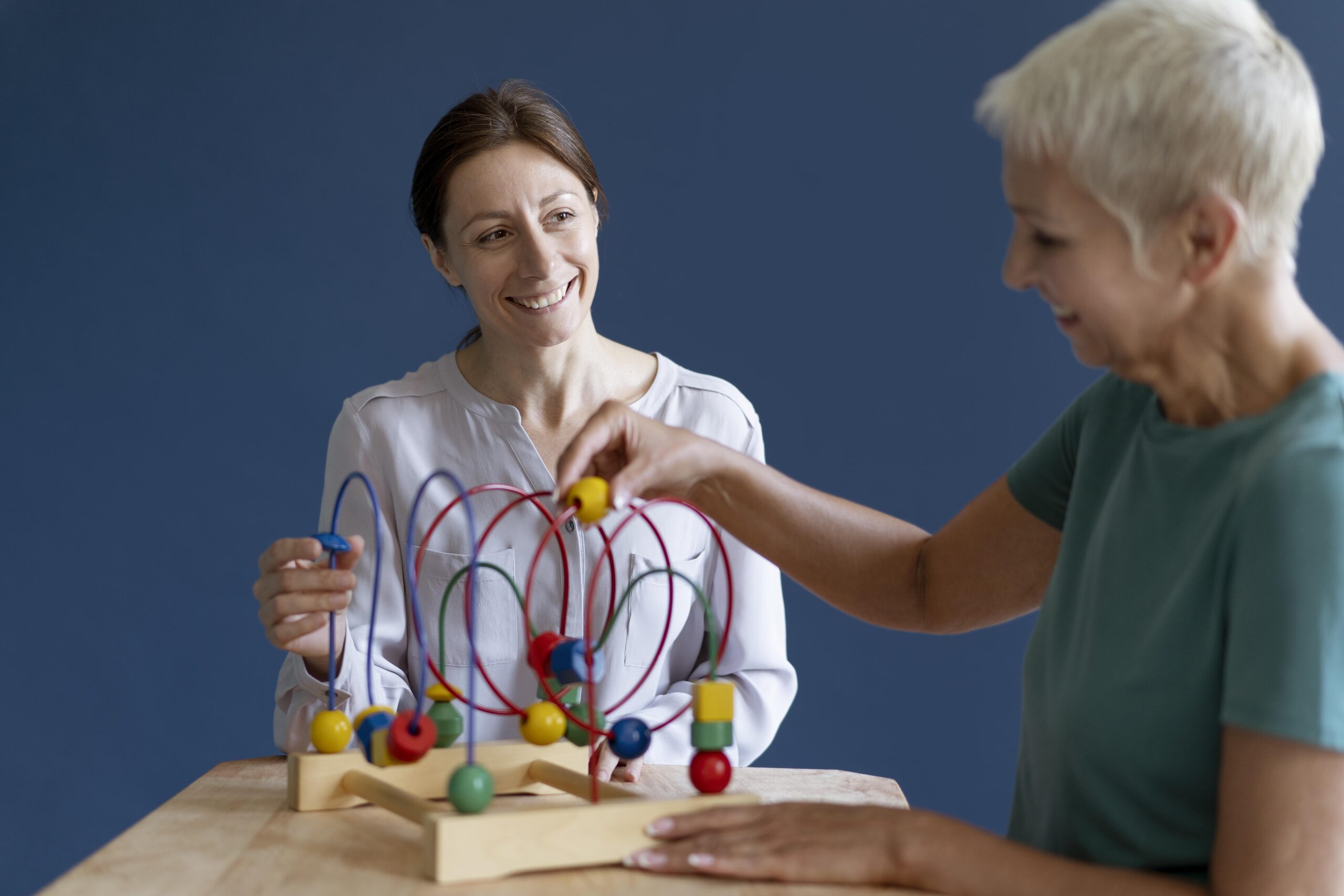 Two women in a therapy session focusing on mental health and psychotherapy treatment options.